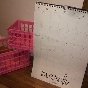 Used calendar with two pink crates